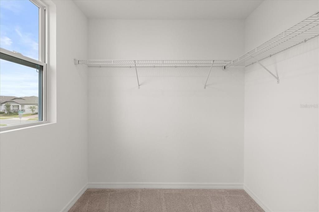 Upstairs walk-in closet