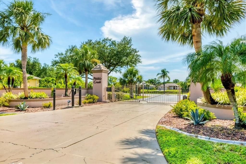 WELCOMING GATED ENTRY TO COMMUNITY