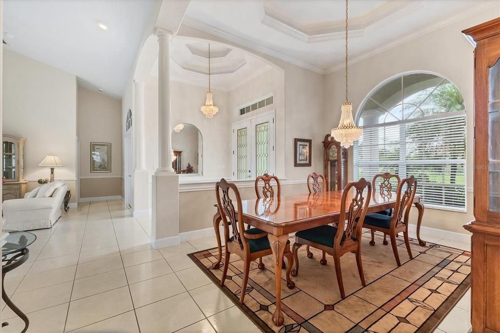 VIEW OF DINING AND ENTRY  FROM HALL TO KITCHEN