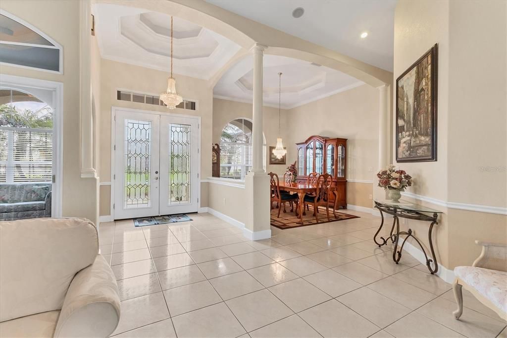VIEW OF ENTRY AND DINING FROM FORM LIVING ROOM
