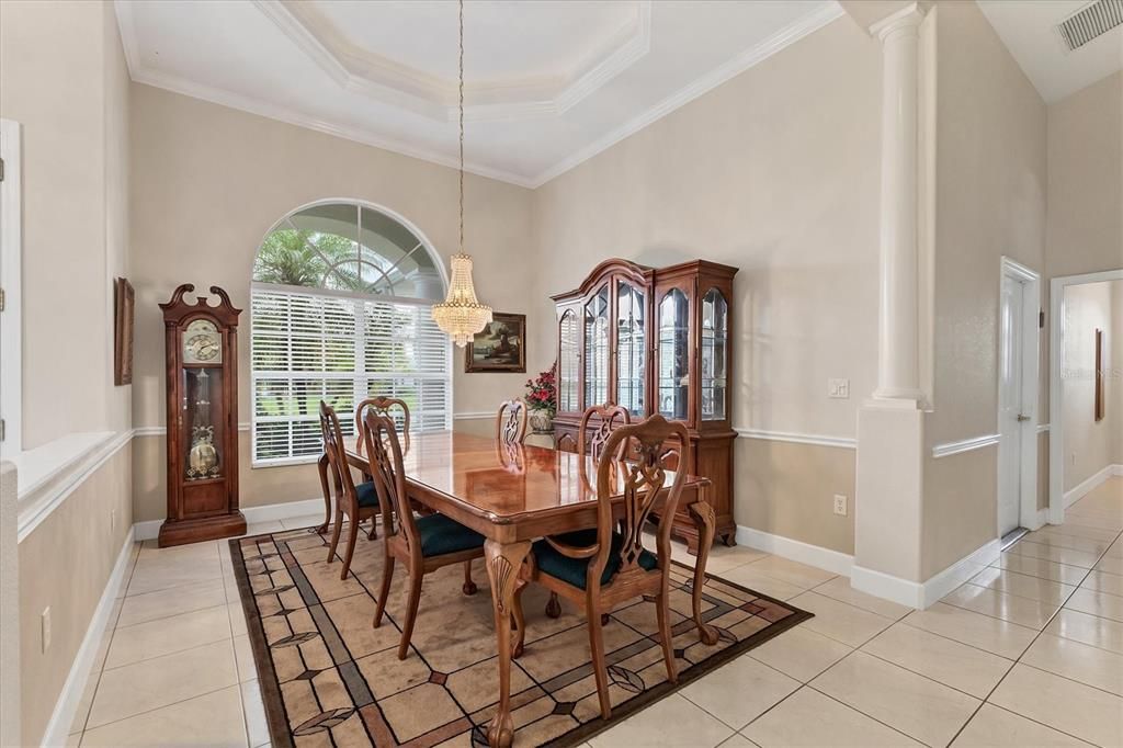 DINING ROOM WITH LIGHTED TRAY CEILING