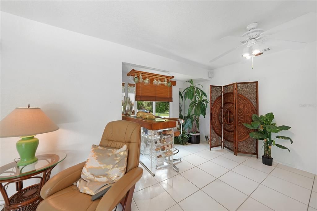 Versatile flex room with pool access—easy conversion back to bedroom