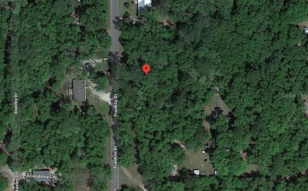 For Sale: $64,400 (0.57 acres)