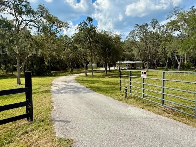 BEAUTIFUL 4.7 ACRES WITH SCATTERED OAKS