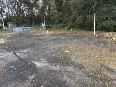 Active With Contract: $25,000 (0.21 acres)