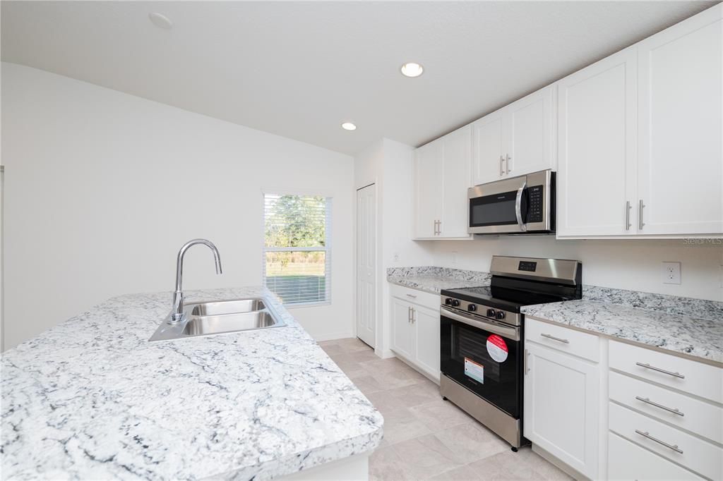 Active With Contract: $306,480 (3 beds, 2 baths, 1447 Square Feet)