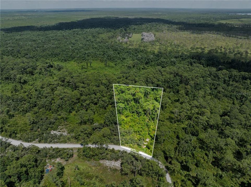 На продажу: $49,000 (2.49 acres)