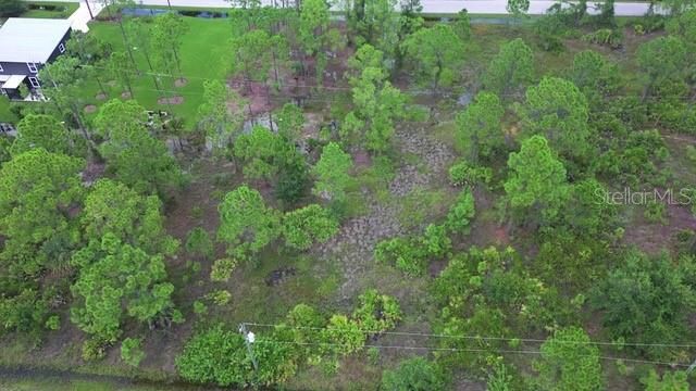 На продажу: $48,500 (0.49 acres)