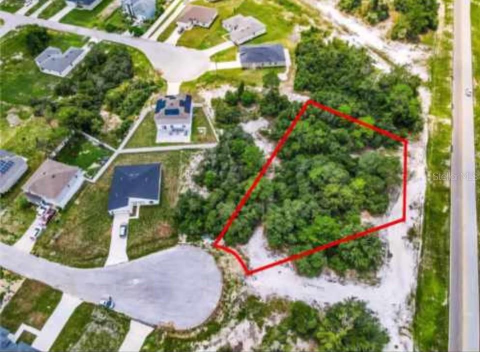 For Sale: $87,000 (0.57 acres)