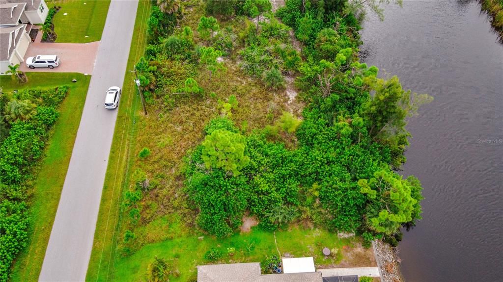 For Sale: $90,000 (0.24 acres)