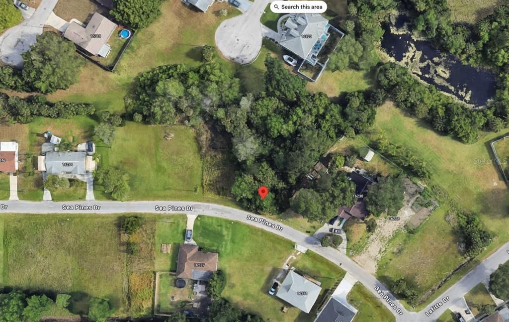 For Sale: $18,700 (0.19 acres)