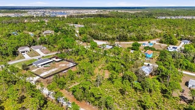 На продажу: $55,000 (0.56 acres)