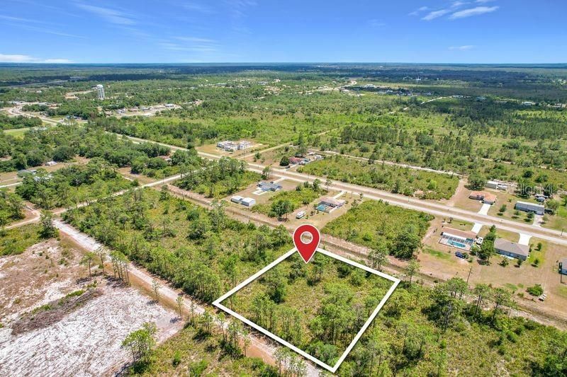 En Venta: $19,500 (0.50 acres)
