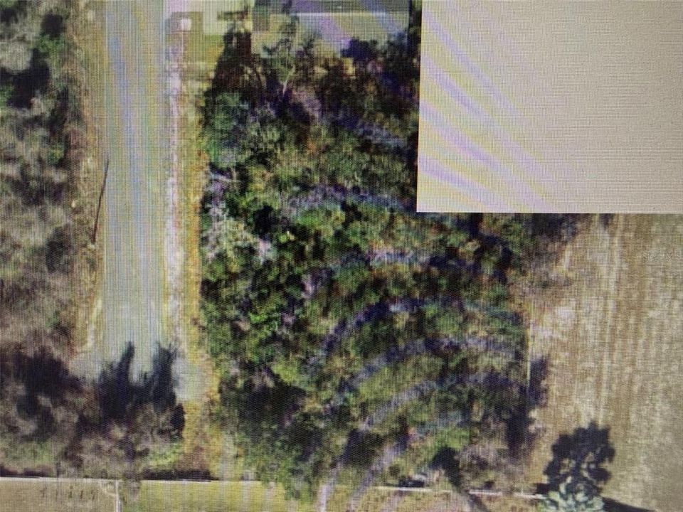 Active With Contract: $30,000 (0.18 acres)