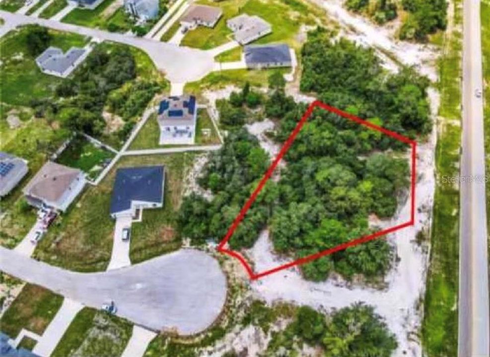 For Sale: $79,000 (0.57 acres)