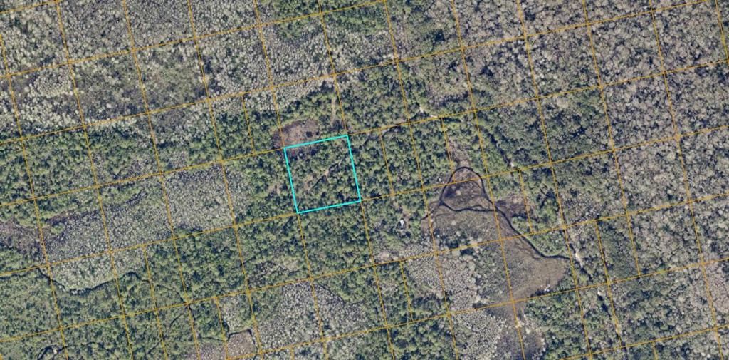 En Venta: $14,000 (2.50 acres)