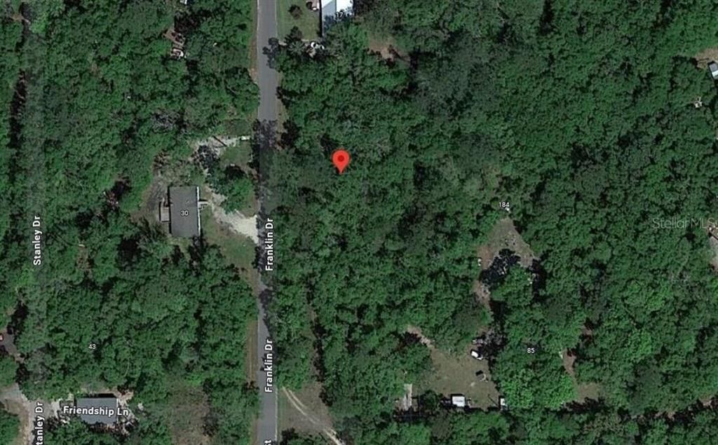 For Sale: $62,400 (0.57 acres)