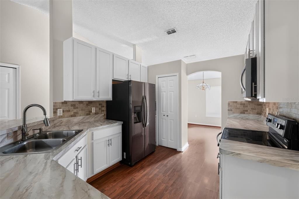 For Sale: $320,000 (4 beds, 3 baths, 2011 Square Feet)