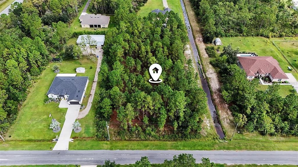 На продажу: $80,000 (1.24 acres)