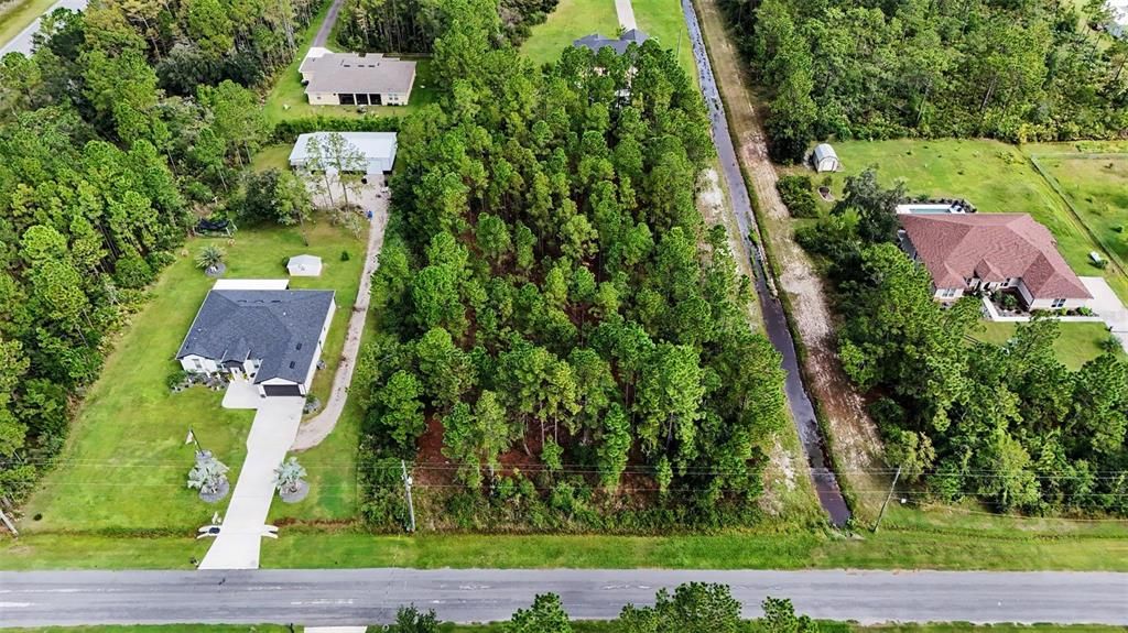 На продажу: $80,000 (1.24 acres)