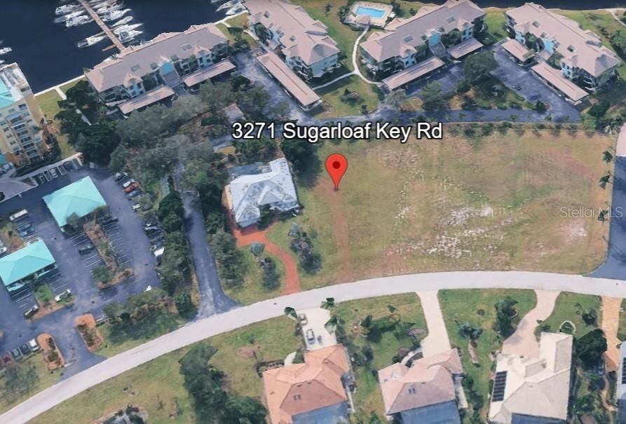 Active With Contract: $115,000 (0.39 acres)