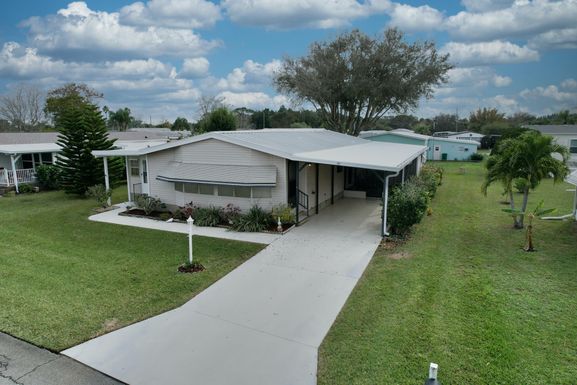 921 Cypress, Barefoot Bay, FL 32976