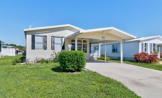 832 Lychee, Barefoot Bay, FL 32976