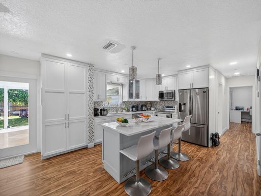 7026 Pine Tree, Lake Clarke Shores, FL 33406