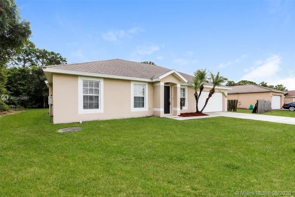 1062 SW Longfellow Rd, Port St. Lucie FL 34953