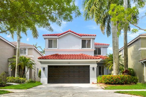 1058 Golden Cane Dr, Weston FL 33327