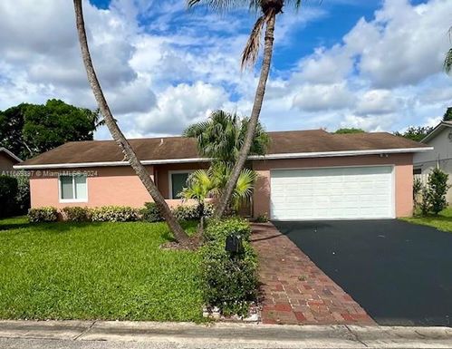 9771 NW 23rd Ct, Coral Springs FL 33065