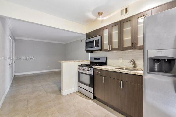 241 S Royal Poinciana Blvd # 206, Miami Springs FL 33166