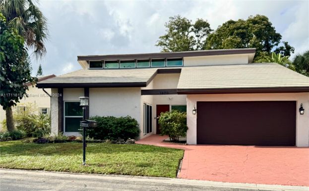 1670 Riverwood Ln, Coral Springs FL 33071