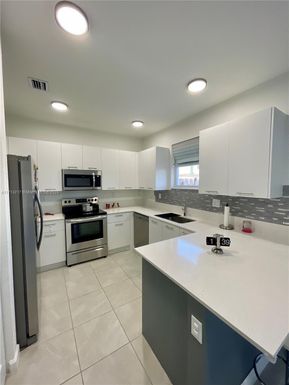 23RD NW PL # 12751, Miami Shores FL 33167