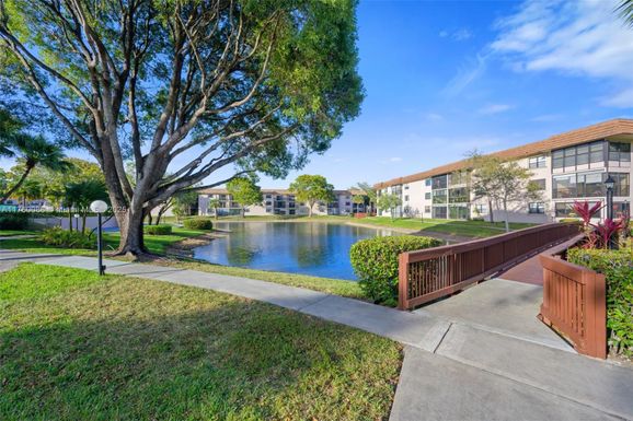 4965 E Sabal Palm Blvd # 212, Tamarac FL 33319
