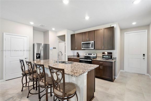 5720 Mentmore Dr, Mangonia Park FL 33407