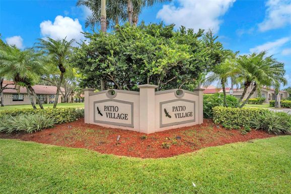 566 VILLAGE LAKE DRIVE, Weston FL 33326