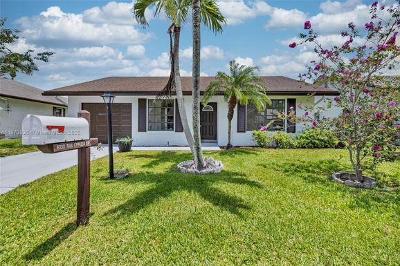 6338 Tall Cypress Cir, Green Acres FL 33463