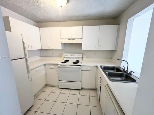 910 Cypress Way E, Palm Springs FL 33406