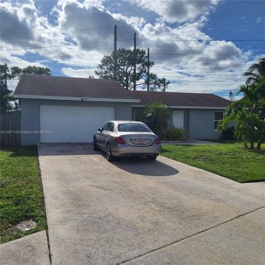 127 Seagull Ct, Royal Palm Beach FL 33411