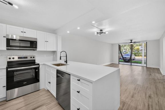 6190 Woodlands Blvd # 106, Tamarac FL 33319