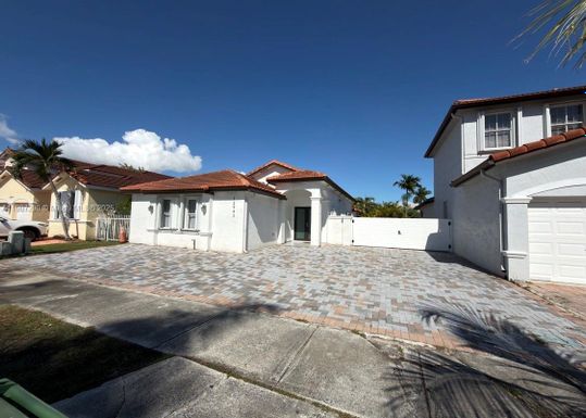 12943 NW 7th Ln, Miami FL 33182