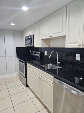 6930 Miami Gardens Dr # 412, Hialeah FL 33015