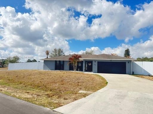 702 NW Orchid St, Port St. Lucie FL 34983