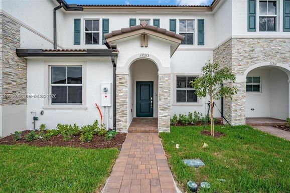 12313 NW 23rd Court, Miami FL 33167