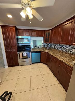 6095 N Sabal Palm Blvd # 104, Tamarac FL 33319