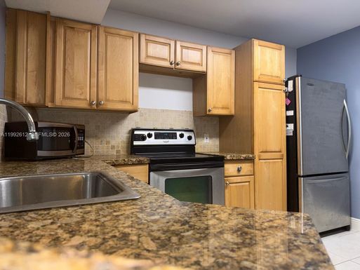 8901 Wiles Rd # 103, Coral Springs FL 33067