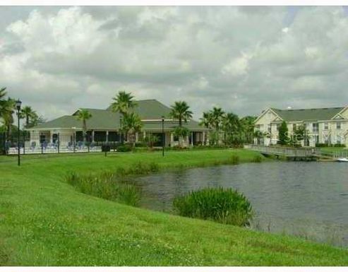 9210 LAKE CHASE ISLAND WAY UNIT --