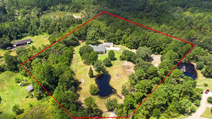 31040 WHISPERING PINES COURT