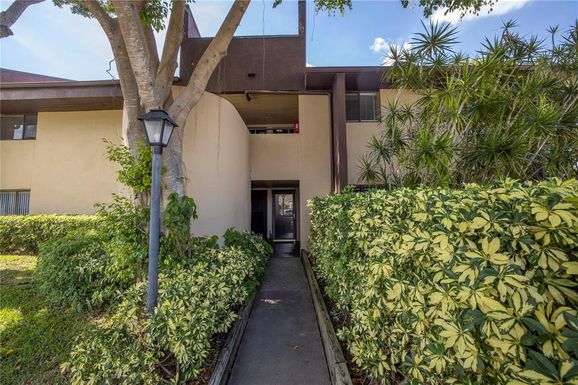 10775 VILLAGE CLUB CIR N UNIT 106